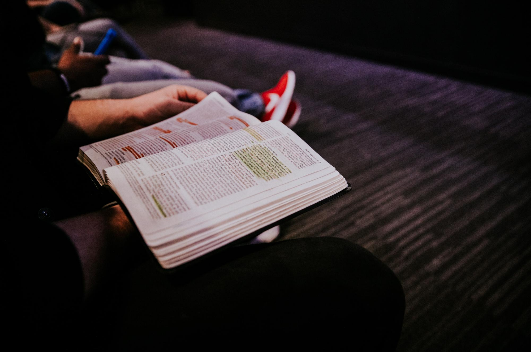 "Person Reading Book" by Hannah Busing on Unsplash "Person Reading Book" by Hannah Busing on Unsplash