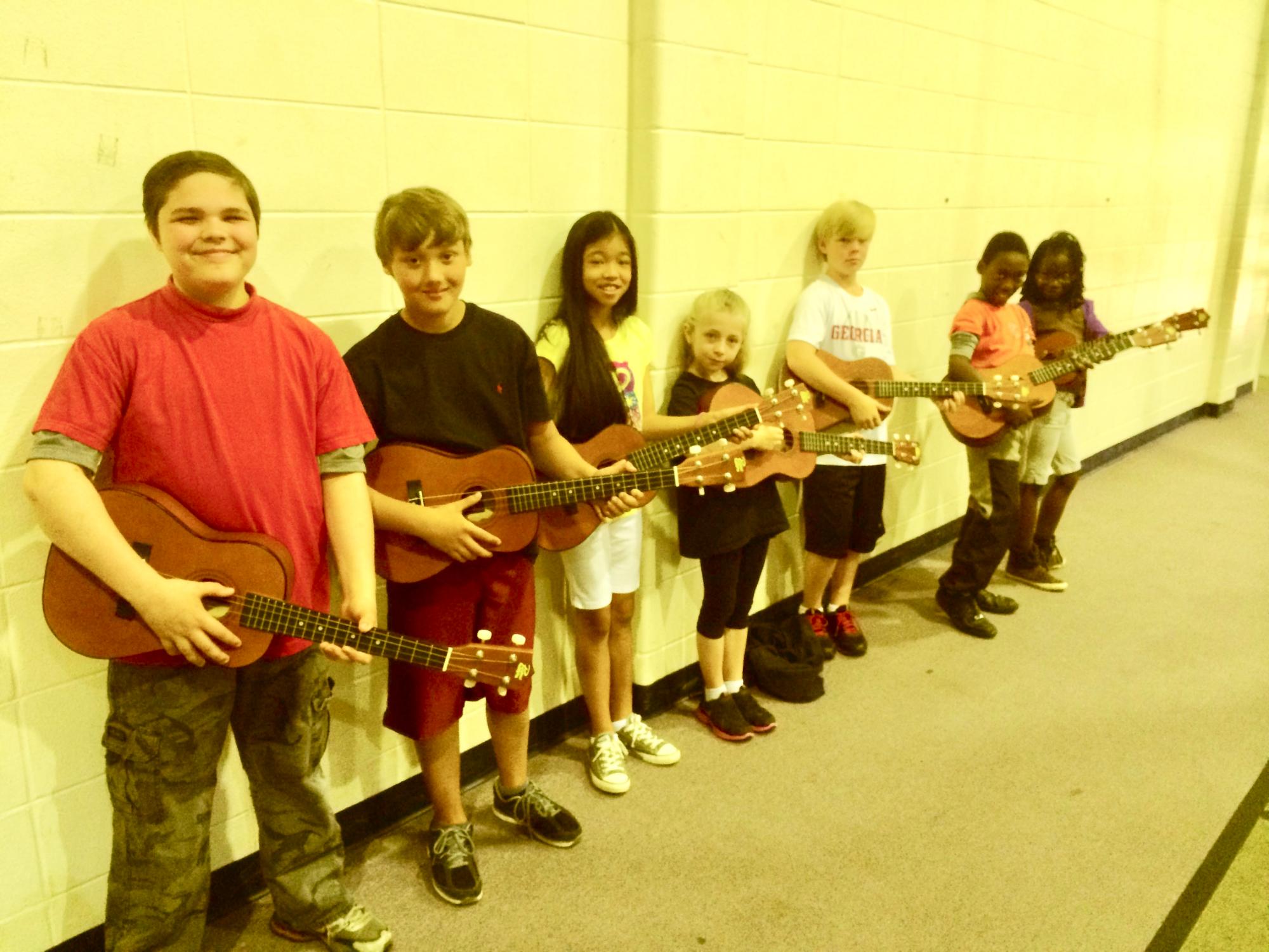 Baritone Ukulele Students Holding Their Instruments by Charles Van Deursen Baritone Ukulele Students Holding Their Instruments by Charles Van Deursen
